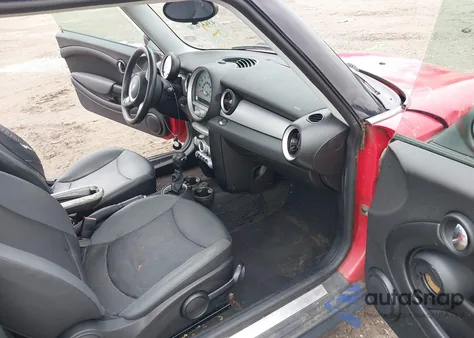 2010 Mini Cooper z USA, uszkodzony, nr VIN WMWMF3C57ATZ24134